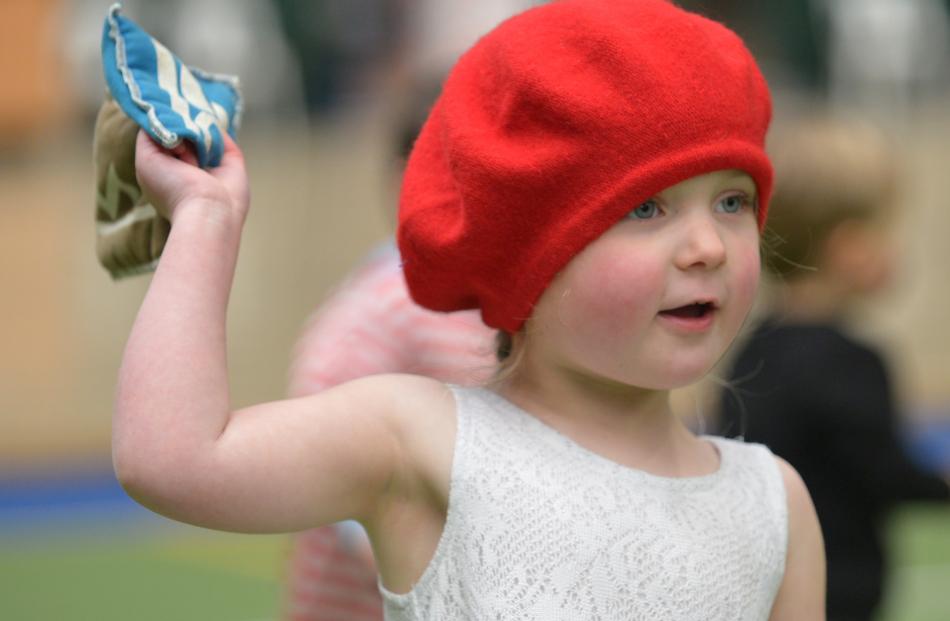 Pippa de Boer (4) represents France in the shot put at the Pioneers children's Olympics. 