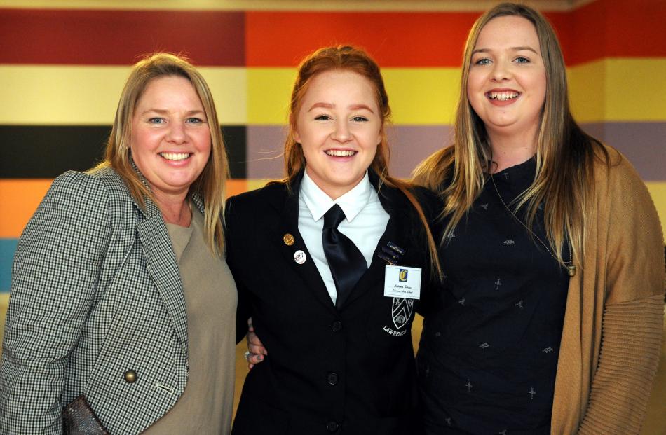 Elizabeth Ritchie, Autumn Forbes and Eden Wilson, all of Lawrence.