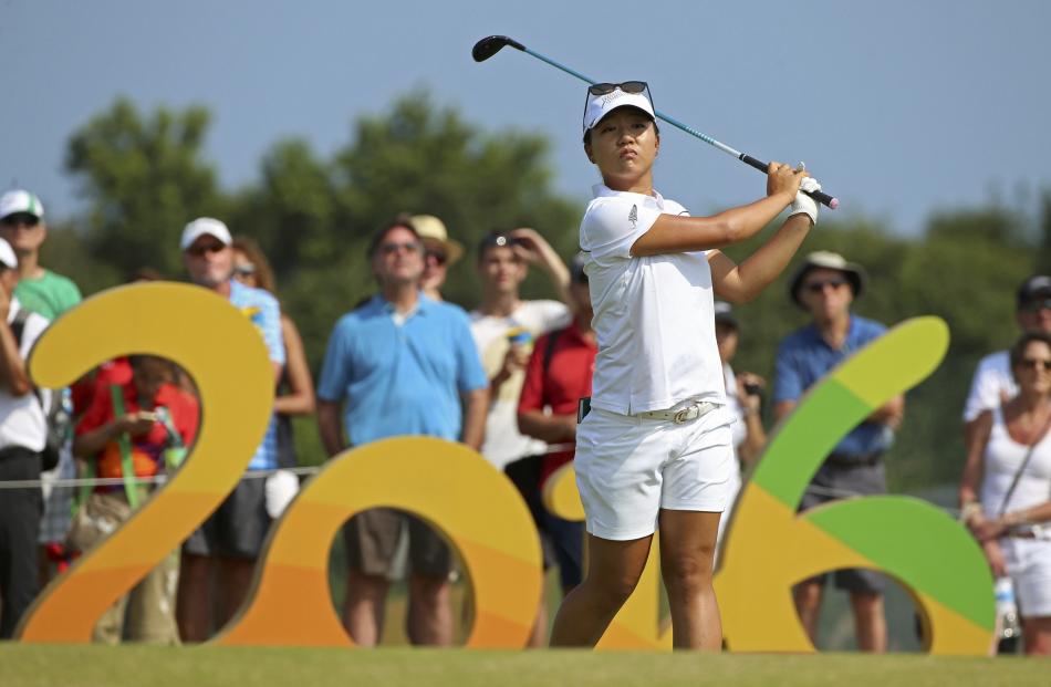 Lydia Ko watches her tee shot on the 16th hole during the third round. Photo: Reuters 