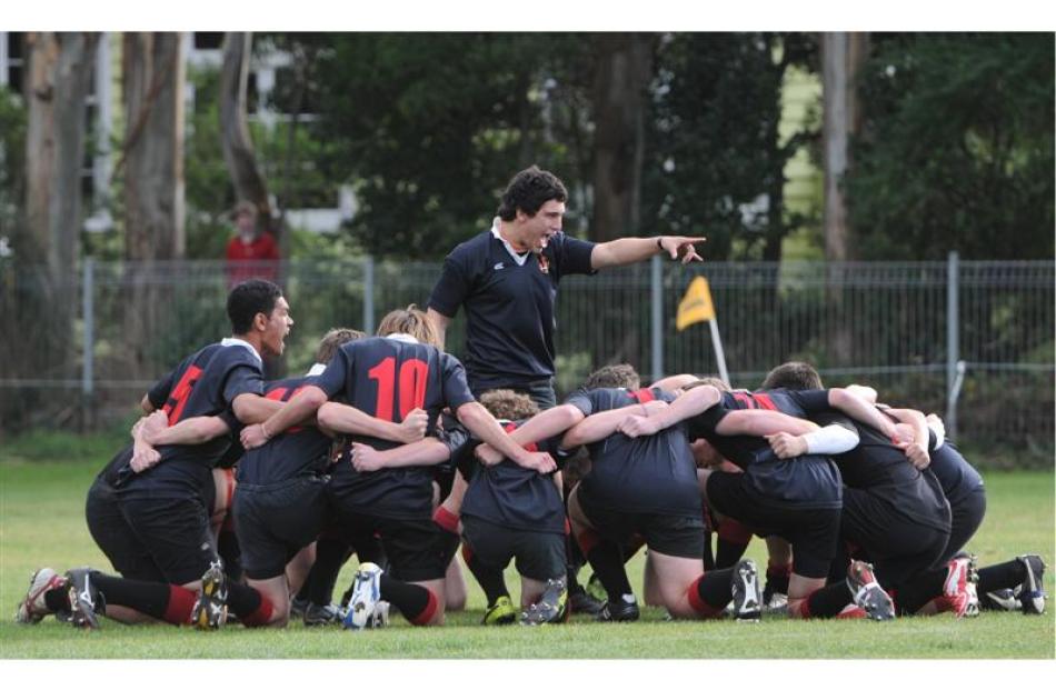 The Waitaki Boys' team perform their haka before kick off.