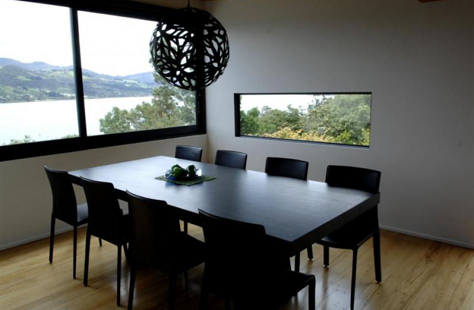 AFTER: The old kitchen area is now the dining area.