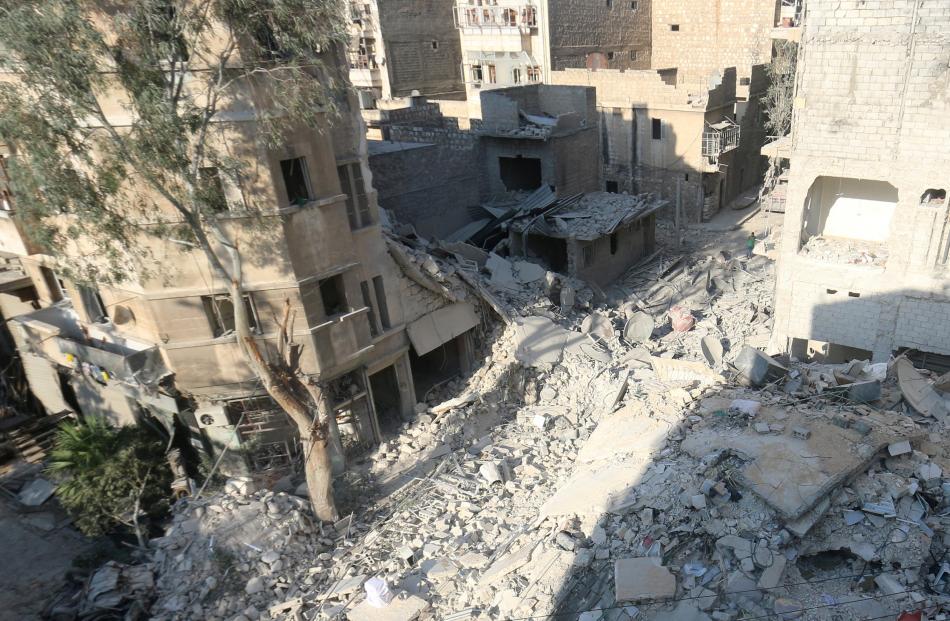 A general view shows the site of the air strike in which Omran Daqneesh was injured. The Daqneesh family lived in the building on the left. Photos from Reuters.