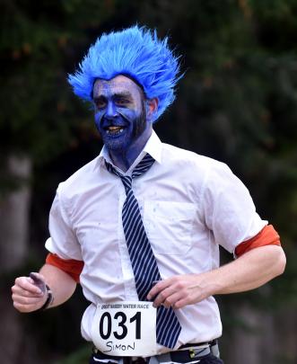 Simon Horan, of Dunedin, injecting some fun into the gruelling run. Photos: Peter McIntosh.