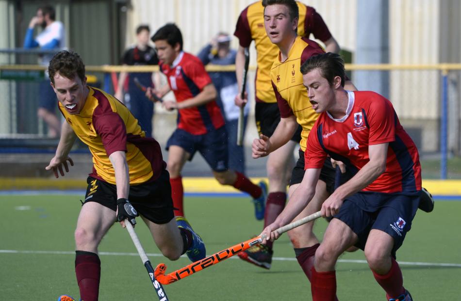 Jack Porter (left), of Cashmere High School, clashes with Jim Hembro, of Macleans College during...