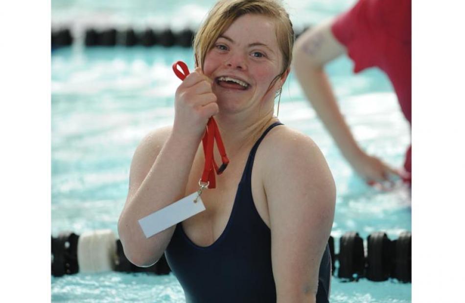 Becky Donovan (Queen's High School) clutches the silver ribbon she received for coming second in...