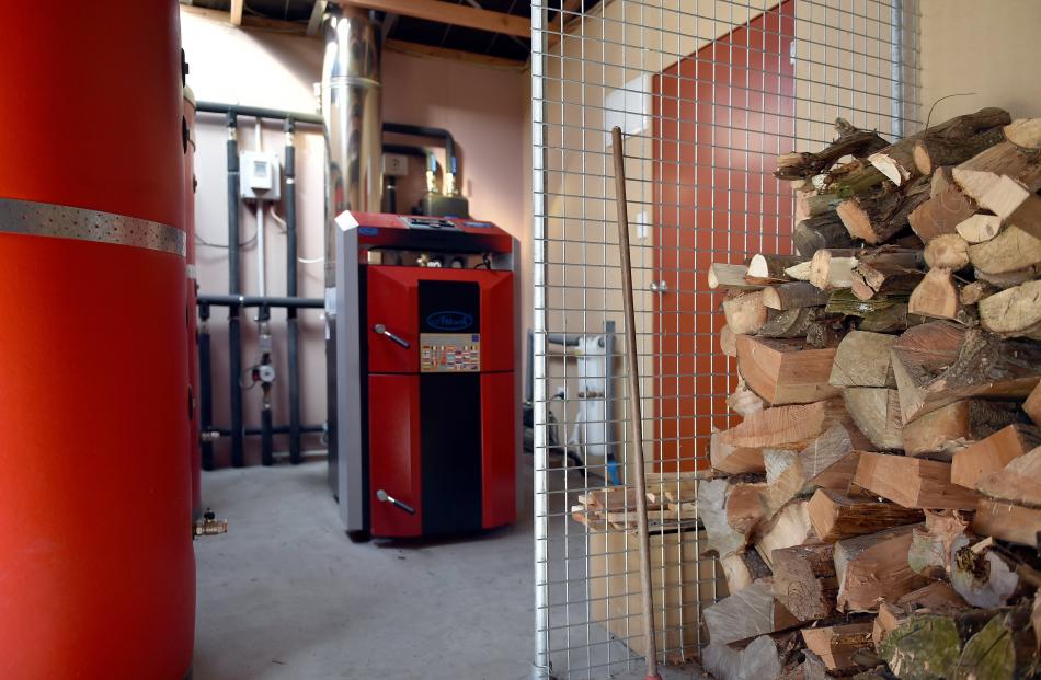Fuelled by the woodlot, the boiler heats the concrete floor, radiators and water. Photo: Gregor Richardson