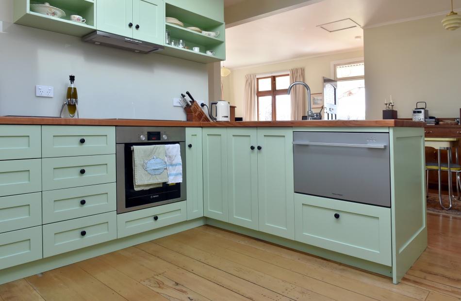 The cottage used to end in the middle of this room but the kitchen is now the transition point between the old and the new. Photo: Gregor Richardson