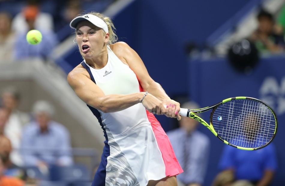 Caroline Wozniacki capitalised on her opponent's ankle injury. Photo: Reuters 