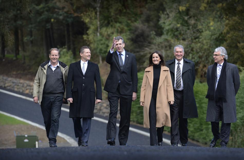 Strolling on Fred Hollows Way in Dunedin are (from left) developer John Dunckley, Australian High Commissioner to New Zealand Peter Woolcott, Fred Hollows Foundation executive director Andrew Bell, Fred's daughter Tanya Woolcott, and foundation board memb