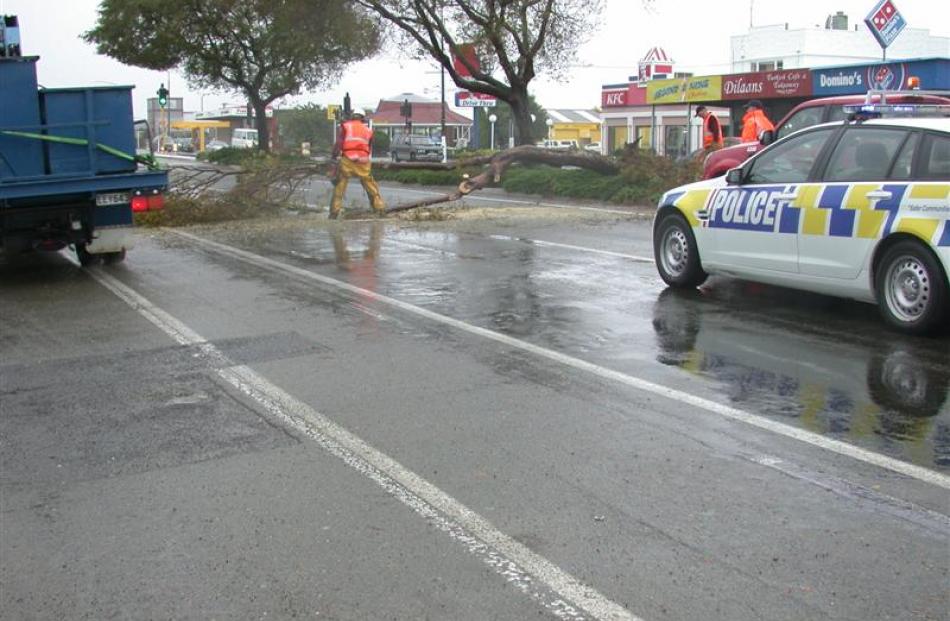 A tree which temporarily blocked Thames St in central Oamaru, felled by strong winds and rain, is...