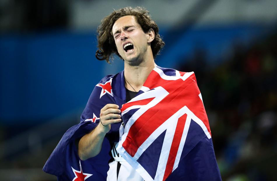 An elated Liam Malone after winning silver in the 100m T44 final. Photo: Getty Images 