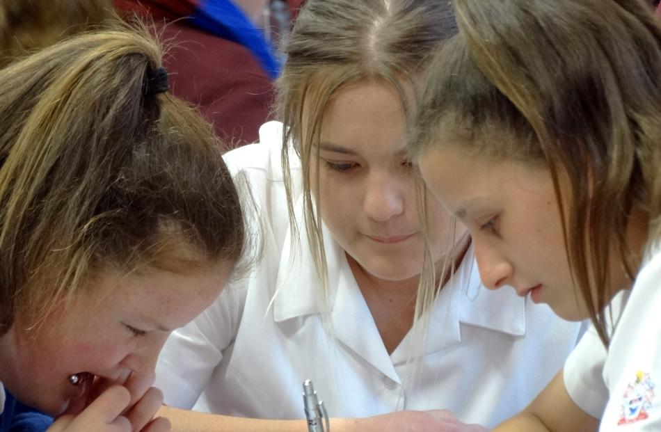 Timaru Girls' High School teammates (from left) Zoe Ross (14), Nicole Wakefield-Hart (14) and...