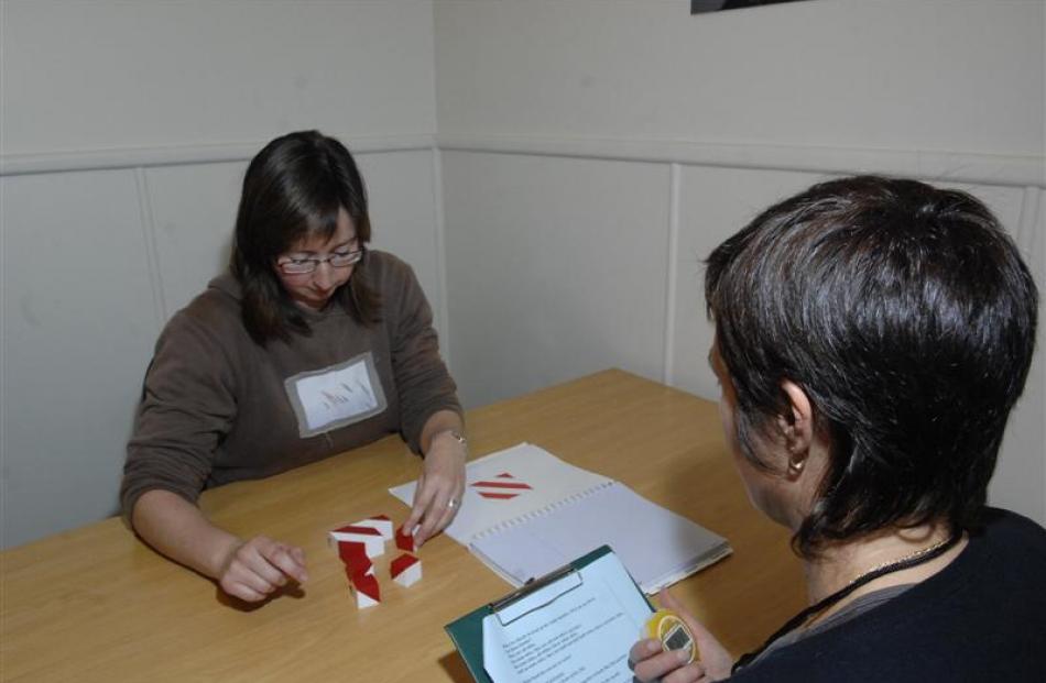 Nicola Brown, of Dunedin, assists the Dunedin Multidisciplinary Study team polish techniques for...