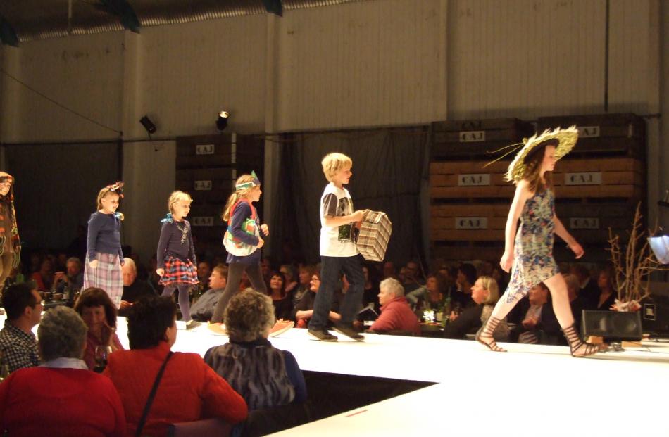 Modelling their own designs are (from left) Isobel and Charlotte McNeish, Jessica and Luke...