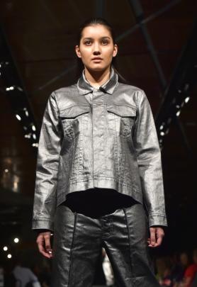 Jasmine Ng wears a metallic creation.