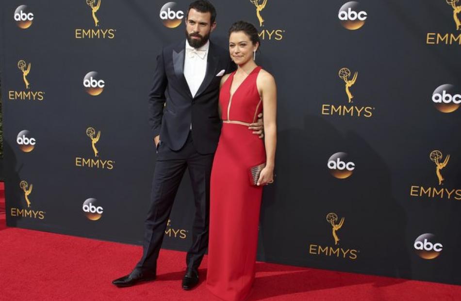 Actress Tatiana Maslany from the BBC series "Orphan Black" and actor Tom Cullen arrive on the red...