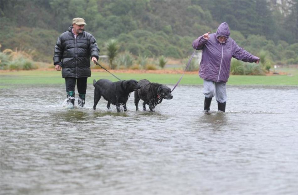 Neville and Sue Maunder take their dogs Jess and Wilbur for a walk on Long Beach Domain. Photo by...