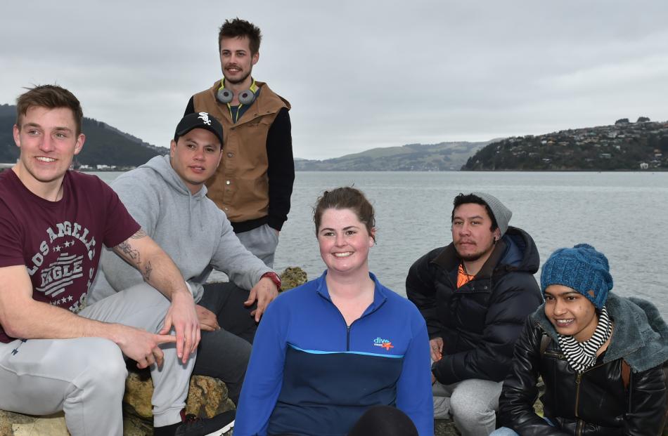 Dive Otago students Reece Groenendal (21), Tama Samuel (26), Jordan Read (23), instructor Gina Watts (23), Shane Timu (30) and Devlina Sinha (30), all of Dunedin, were lucky enough to be entertained by a whale in Otago Harbour. Photo by Gregor Richardson.