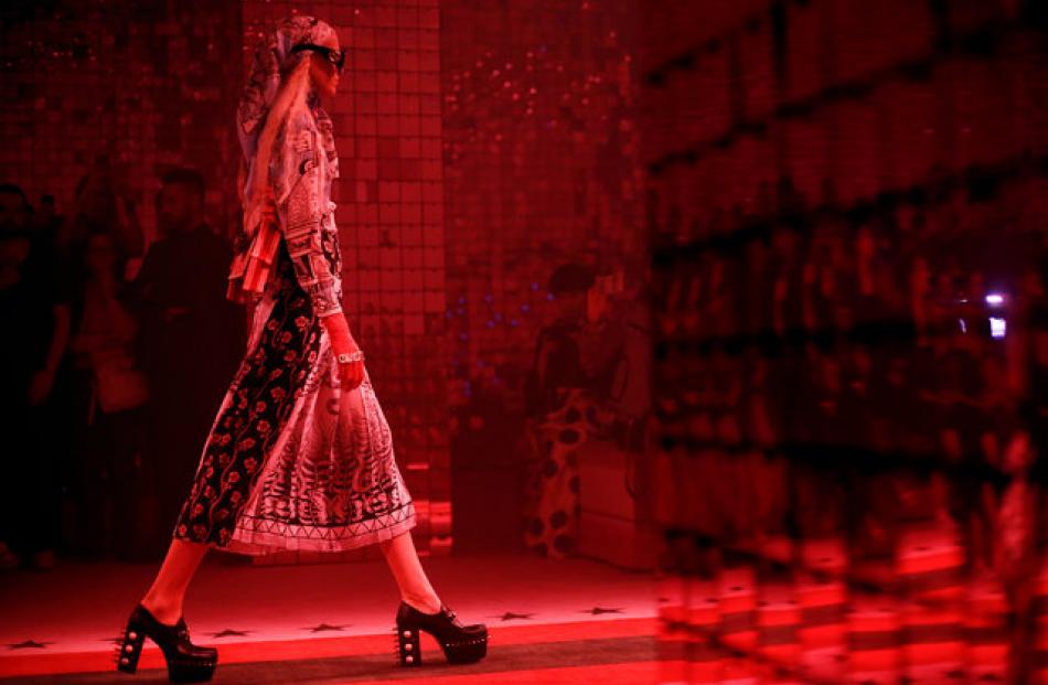 A models shows one of Gucci's 'fantasy' designs at Milan Fashion Week. Photo: Reuters.