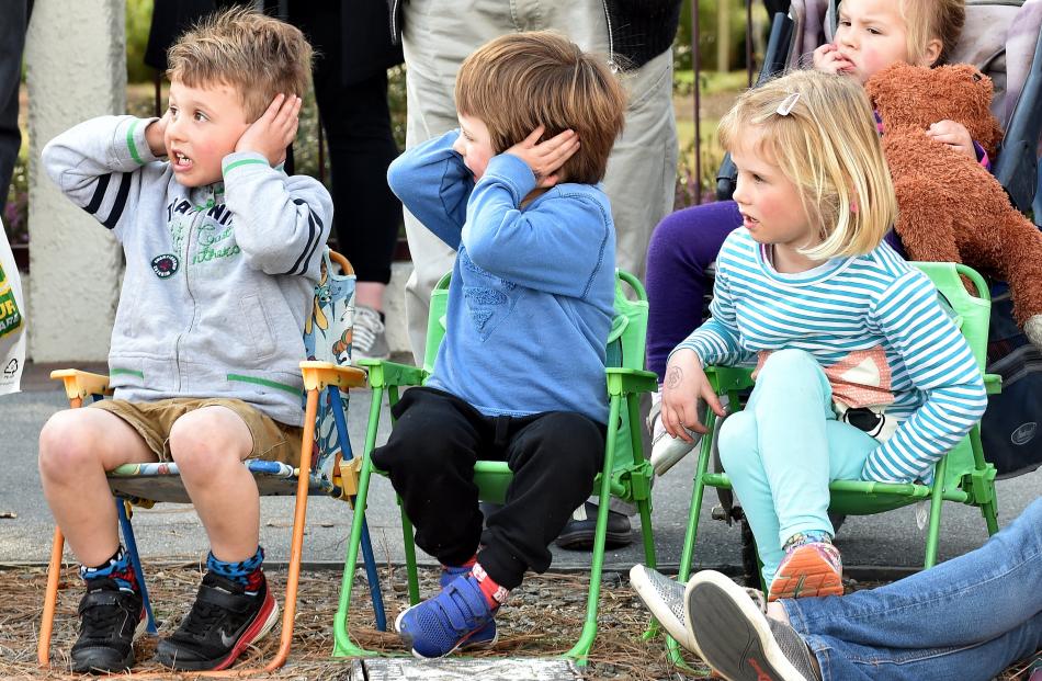Dunedin youngsters (from left) Quinn Jones (4), Hunter McMillan (4) and Hollie Jones (5) watch...