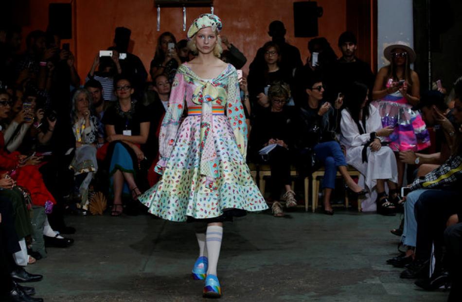 Many designs were accessorised with calf-high socks and tie-up platform shoes with a rainbow...