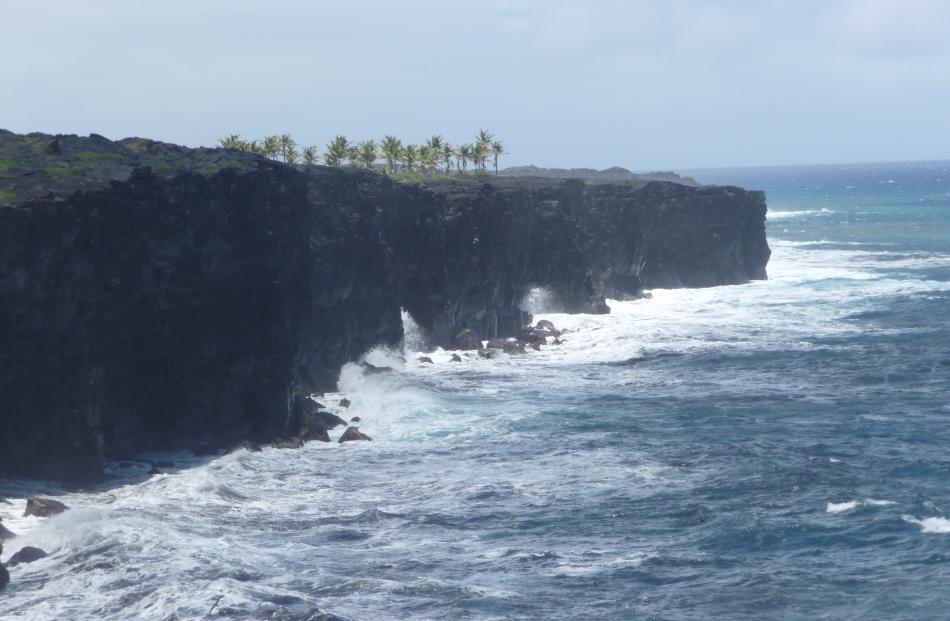 Lava cliffs overlook the sea at the end of the Chain of Craters Road in the Hawaii Volcanoes...