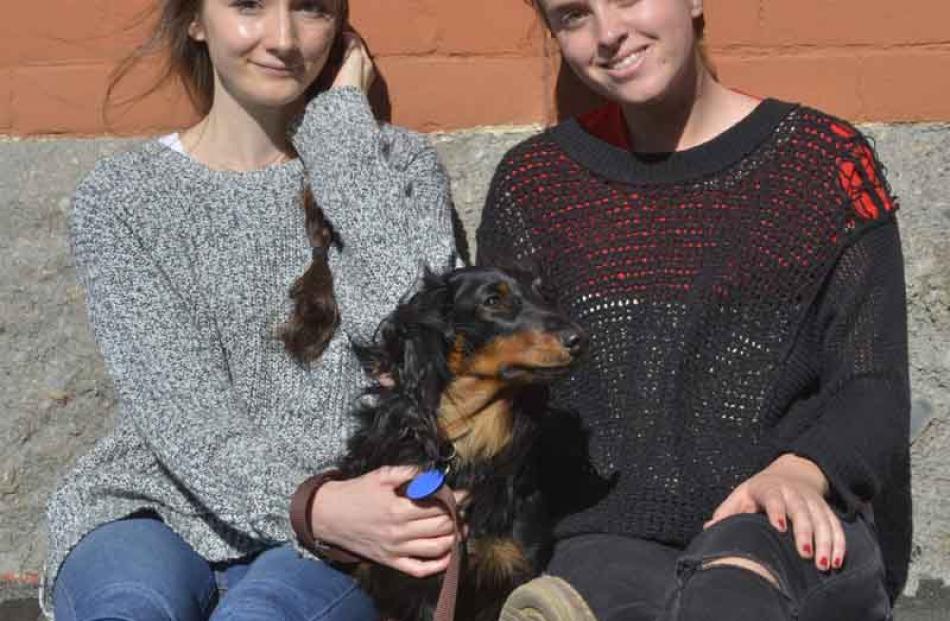 Amy Bird and Teri Urwin, both of Dunedin, with William the dog.