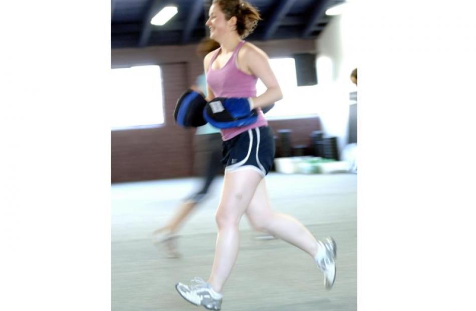 Ellie Constantine participates in a "World title Boxing class" at World Fitness Centre.