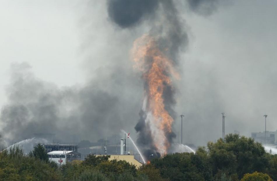 Fire and smoke rise from the factory of chemicals giant BASF in Ludwigshafen. Photo: Reuters