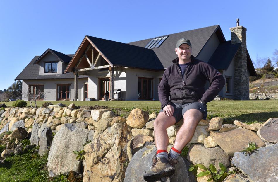Sacha Gray outside the house he built for himself, his wife Emily and their three daughters: ‘‘I...