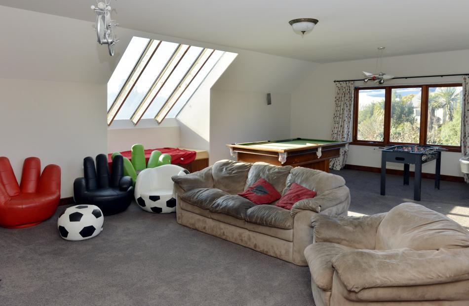 The rumpus room occupies part of the 160sq m of floor space inside the roof. Building into roof...