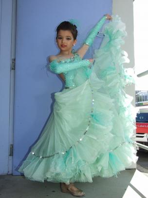 Jaguar  Band (9), of Invercargill, displays her costume for the waltz category. Photos: Lynda van...
