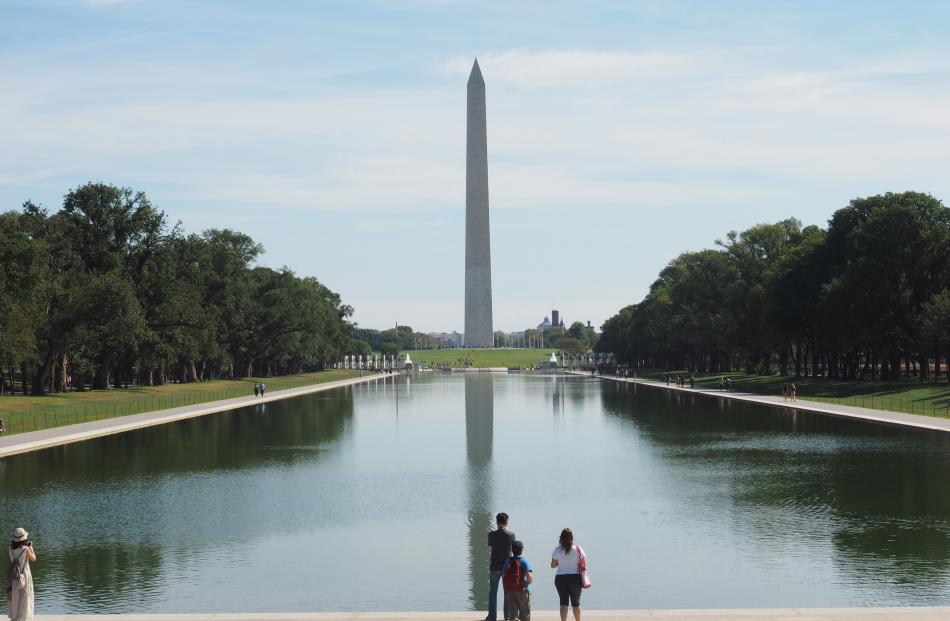The Washington Monument along the National Mall halfway between the Capitol Building and the...
