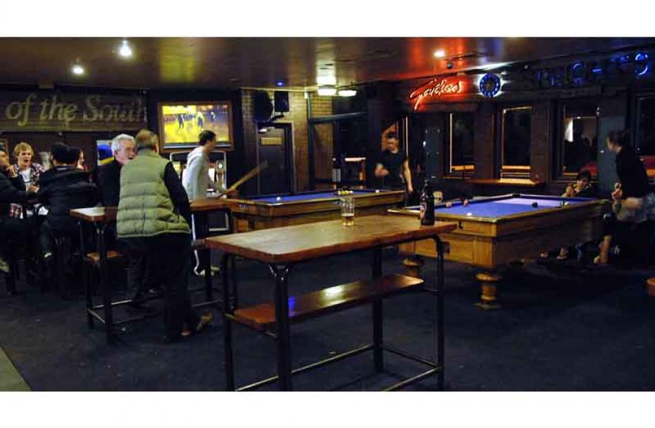 Downstairs bar and pool tables.