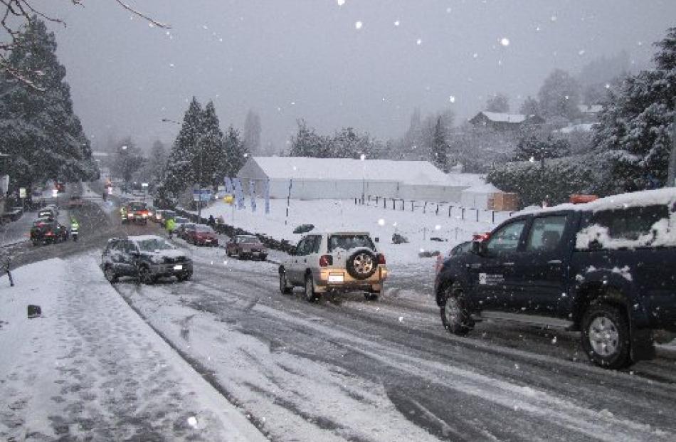 Slippery, snowy road conditions caused mayhem at Stanley St, as the hill leading down to town...