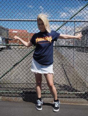 Trasher t-shirt $64.99, skirt and sneakers my own (Vans available at Quest)