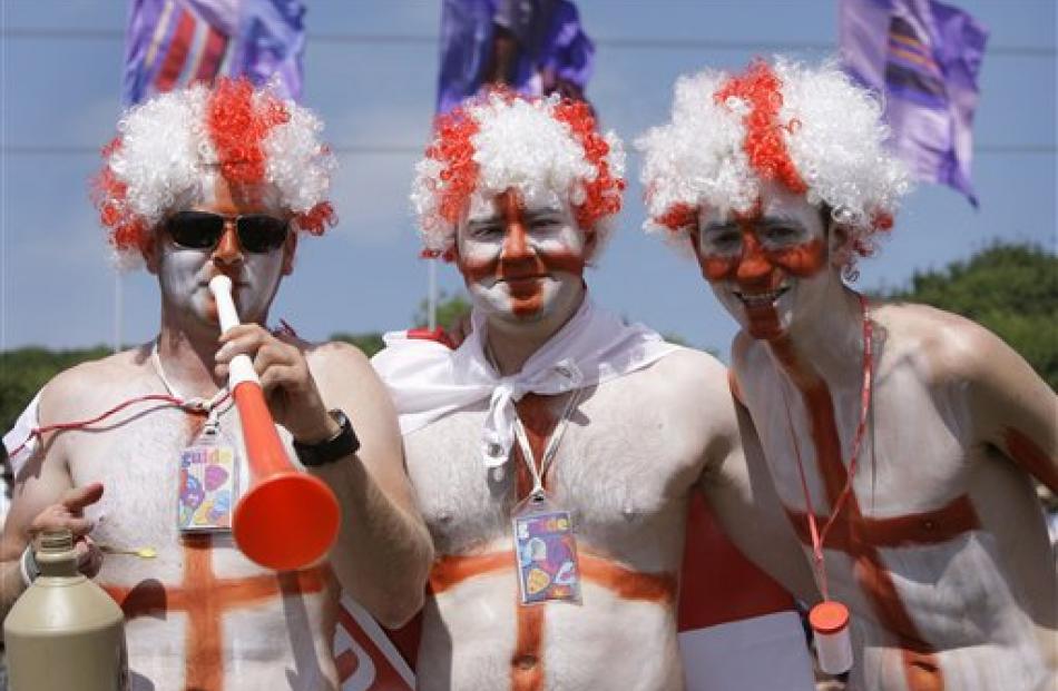 England football fans show their support ahead of the game as crowds gather to watch the action...