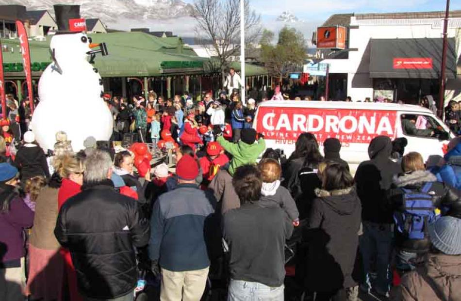 Cardrona's giant snowman parades on Camp St.