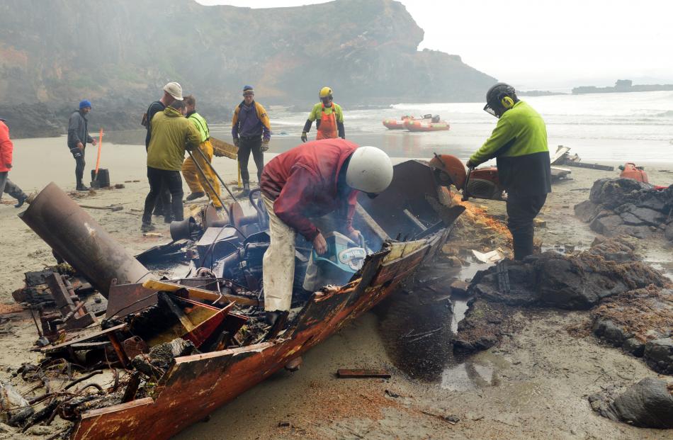 Much of the wreck of Renegade is gone after a salvage crew dismantled the structure on a remote beach at Heyward Point on Tuesday. Photos by Stephen Jaquiery