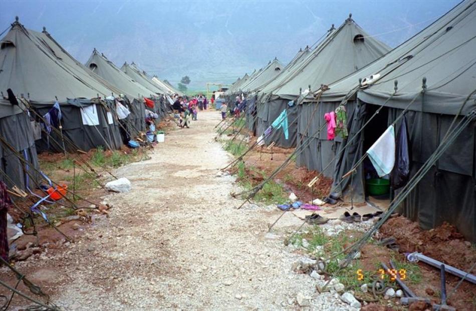 An avenue of tents housing refugees in Kukes, Albania.