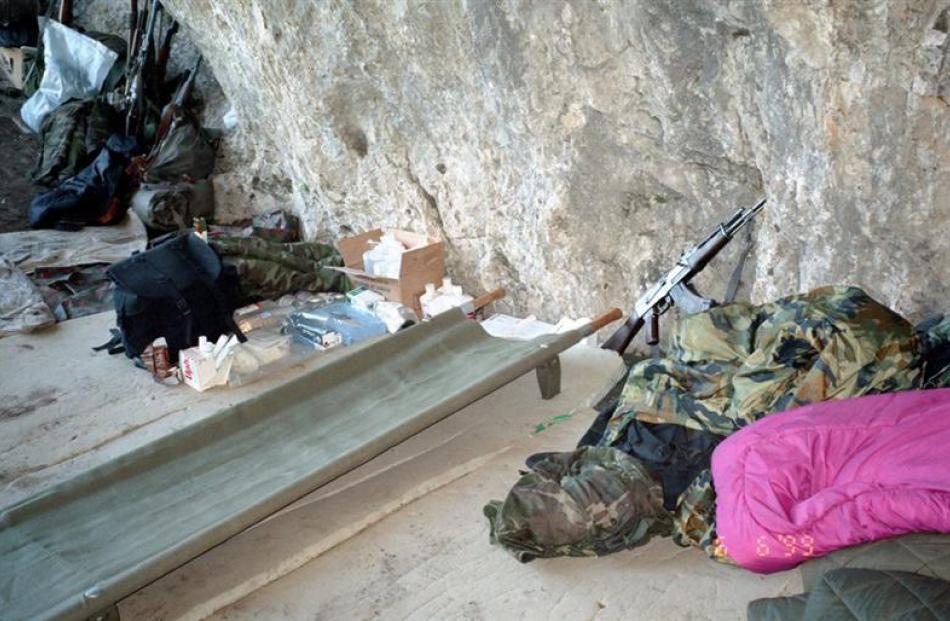 The KLA's "surgical unit" in a cave on Mt Pastrik. An operating stretcher is in the...