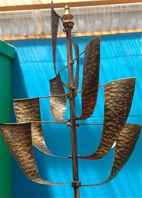  Elegant metal wind sculptures, small enough for the tiniest garden, come in six designs and are ...