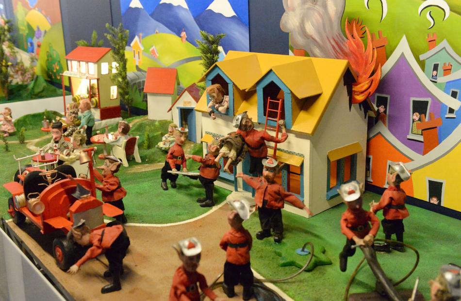  Mechanised pixie firefighters swoop in to save lives in a colourful exhibition. Photos: Linda...