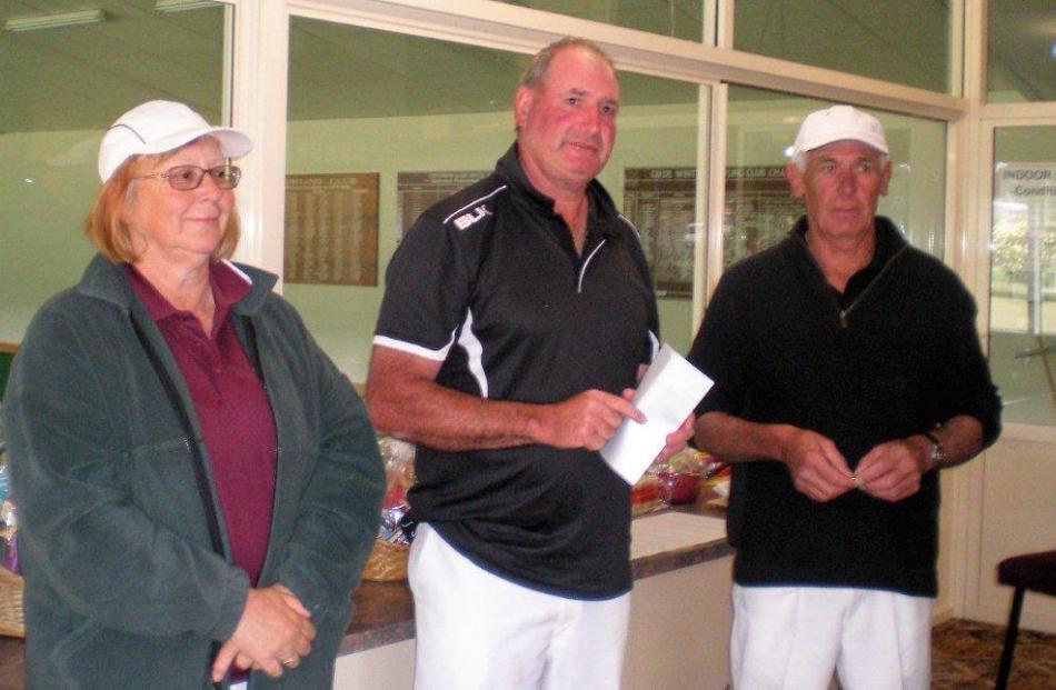 Alexandra’s Trevor Drake (centre) and Steve Rabbette, who won the Central Otago men’s pairs. Also...
