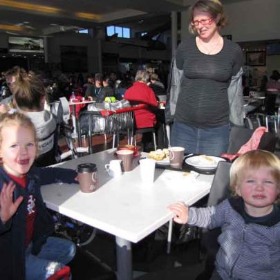 Lily Wenk (4) and Hugo Wenk (3) and their mother Bec Shepherd grabbed some refreshments at the cafe.