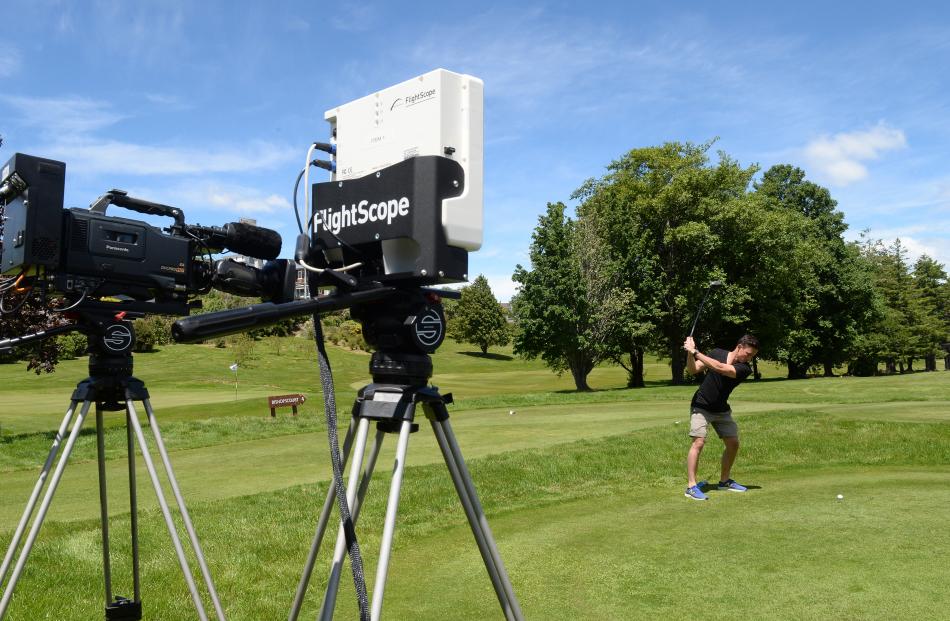 Animation Research Ltd's Ben Taylor tees off at the Otago Golf Club's Balmacewen course to test...