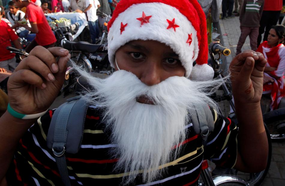 A boy at a peace rally in Karachi, Pakistan. Photo: Reuters