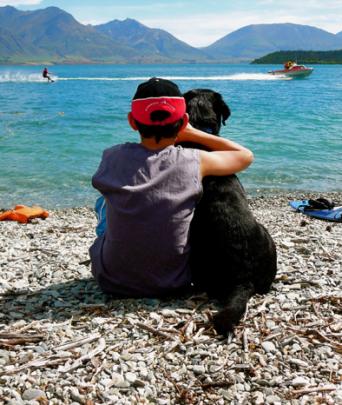 Taking a rest . . . Hayden Beardsmore (11) on holiday from Albany, Australia, and Bounce take in...