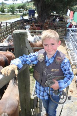 Up-and-coming bull rider Jack Muir, of Wyndham, is decked out in his rodeo gear in Millers Flat...