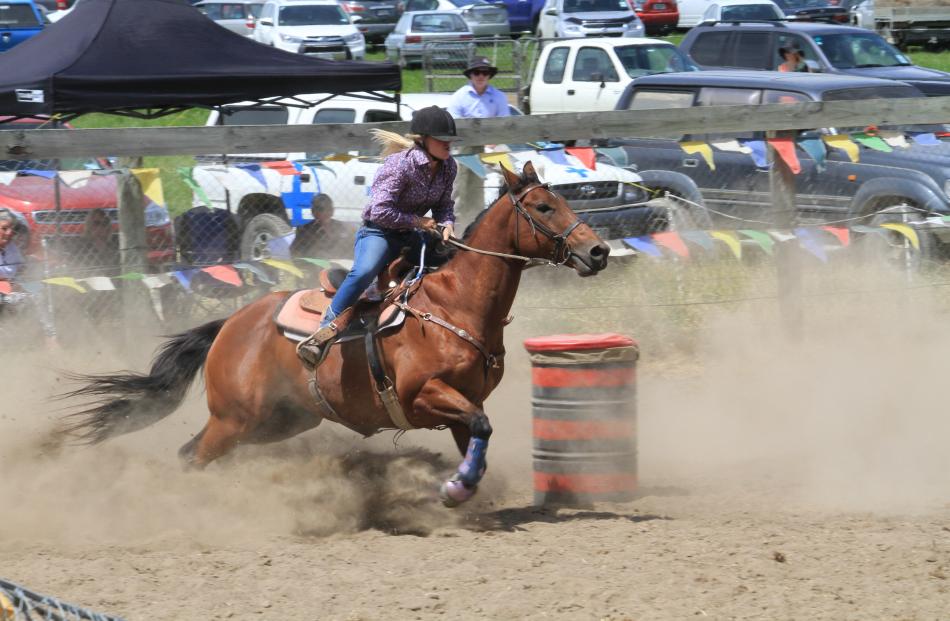 Second-division barrel racer Brooke Elstob, of Darfield, rounds the final barrel in her race.